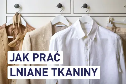 Jak prać len? Eleganckie lniane ubrania wiszą na wieszakach, gotowe do pielęgnacji.