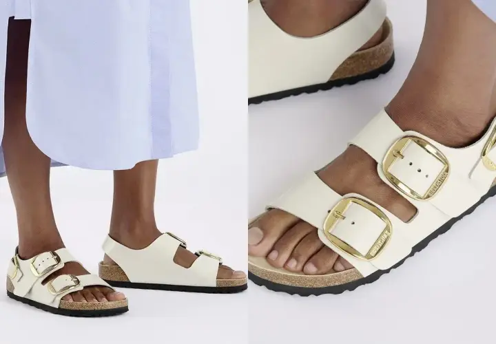 Białe sandały z dużymi złotymi klamrami, idealne na lato. Czy to Bayton czy Birkenstock, wybór należy do Ciebie!