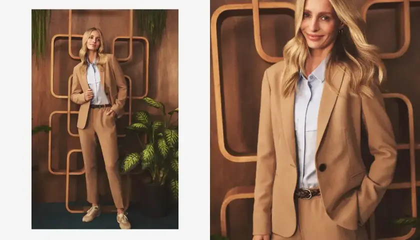 Elegancka stylizacja: jakie spodnie do beżowej marynarki? Modelka prezentuje komplet w odcieniu camel, idealny na co dzień i do pracy.